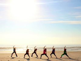 Beach yoga wellness experience